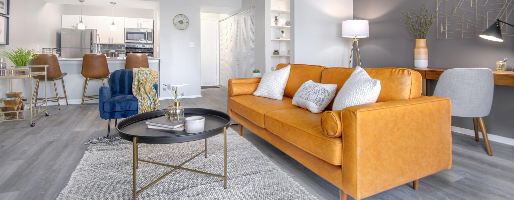 a living room with a couch and coffee table
