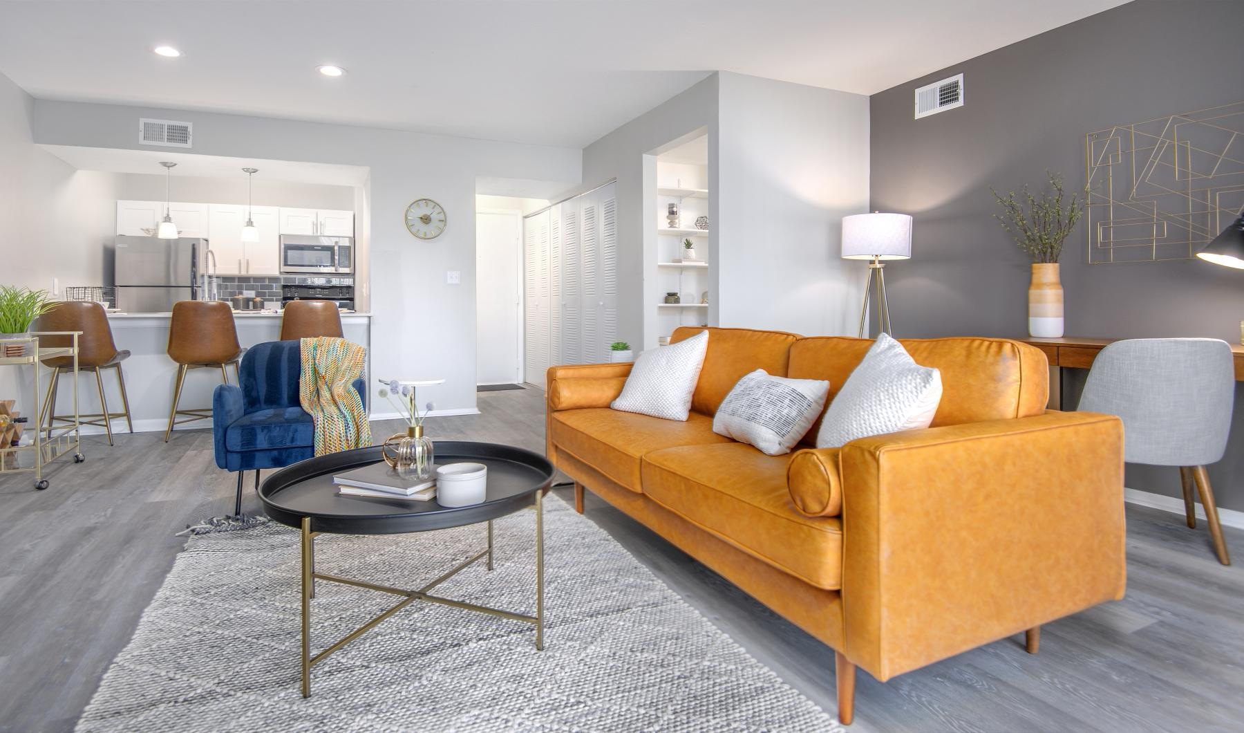 a living room with a couch and coffee table